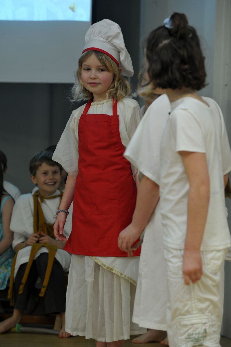  Two pupils performing in assembly